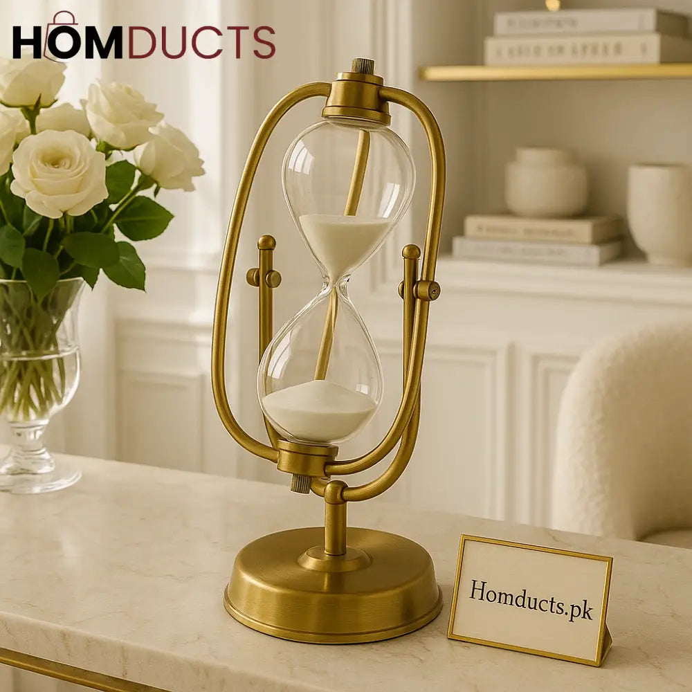 Golden Orbit Rotating Hourglass – Brass Frame with White Sand Timer